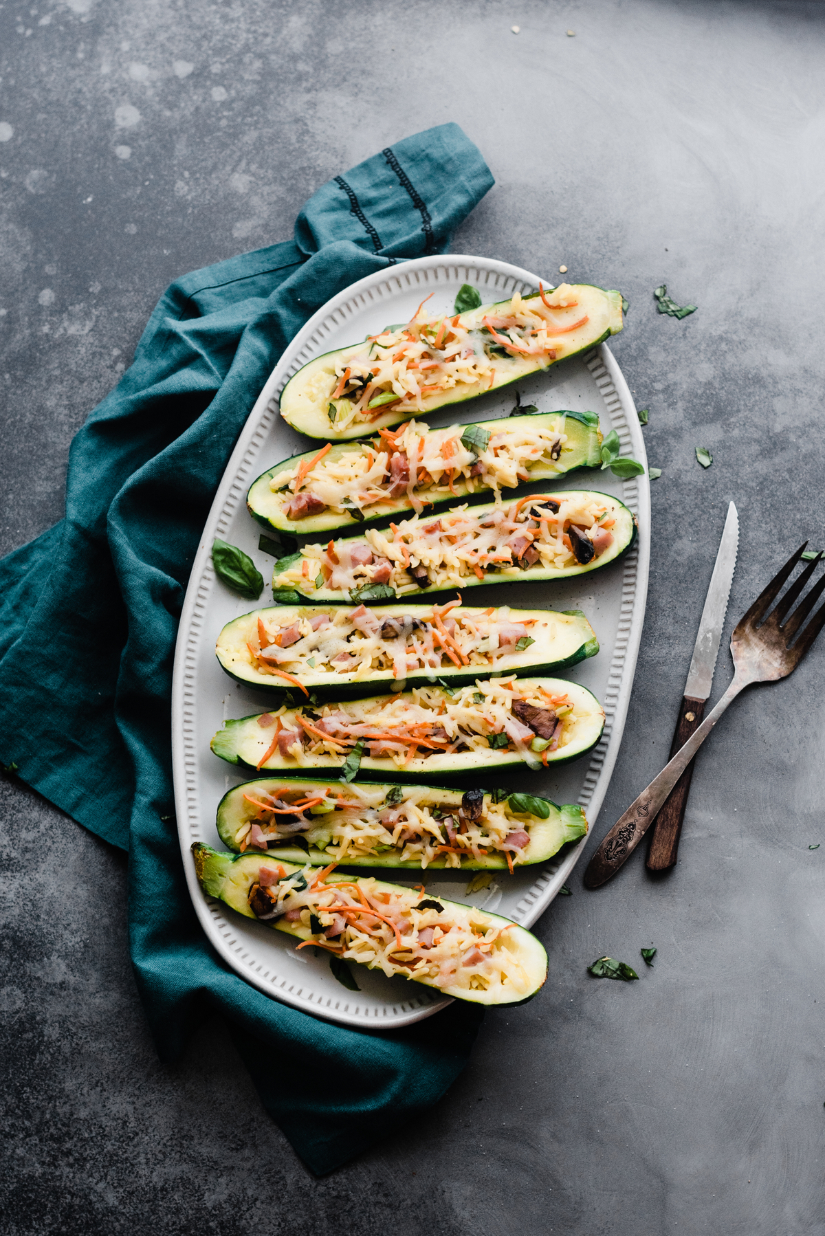 Orzo stuffed zucchini