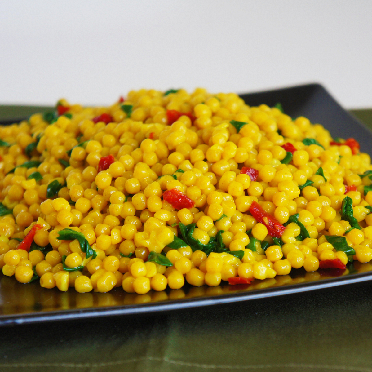 Pearl Couscous Florentine with Sun Dried Tomatoes Recipe